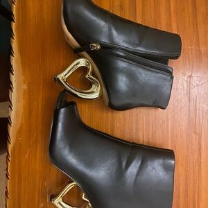Elegant Black Ankle Boots with Gold Heart Heels